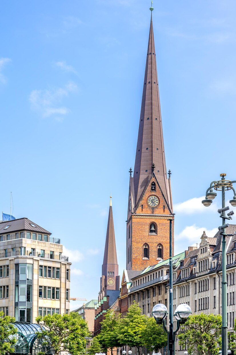 brick-church-urban-spire-city-architecture_169016-68463