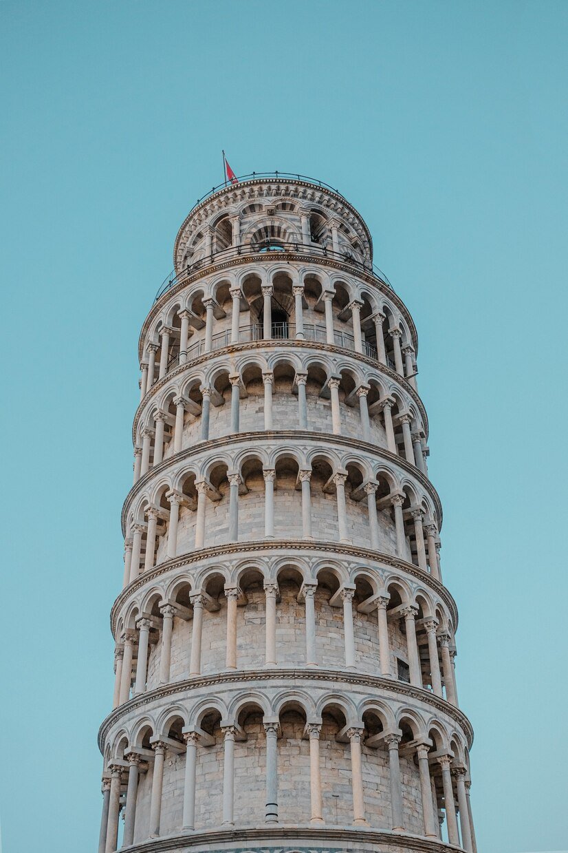 low-angle-shot-beautiful-leaning-tower-pisa-blue-sky_181624-49753